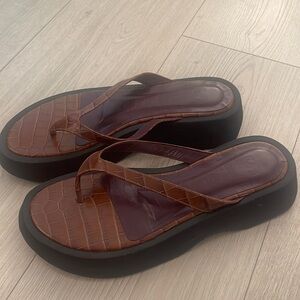 STAUD platform crocodile embossed brown sandals